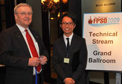 Peter Lovie on left, with Daniel Chen, marketing manager for IQPC